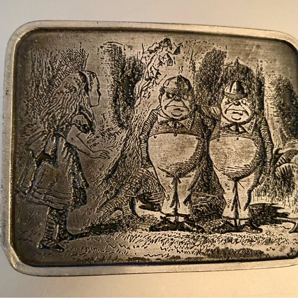 Whimsical Alice in Wonderland brass belt buckle.